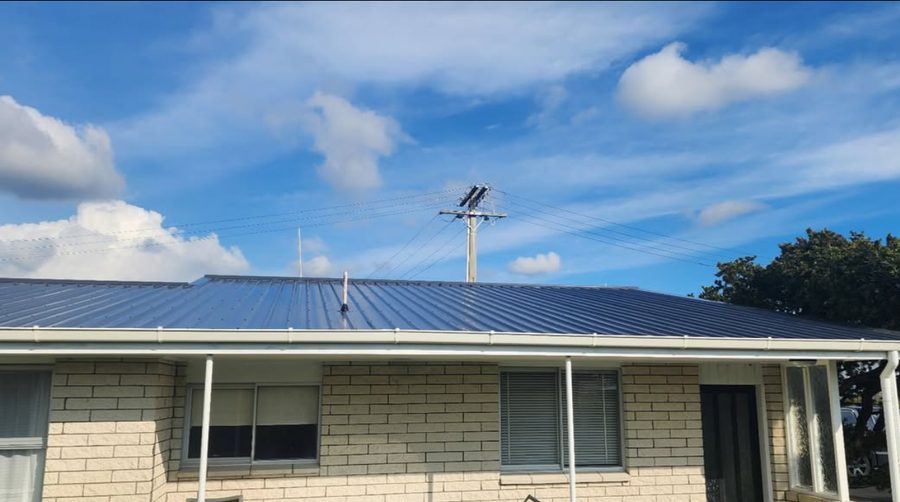 Finished light 5 Rib longrun roof after ADCO Roofing converted the home from tile roofing.