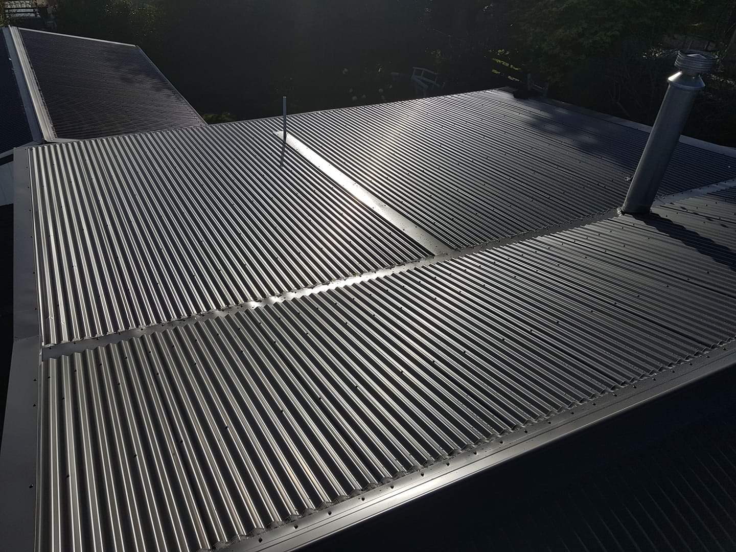 Residential new roofing project with metal roof installation