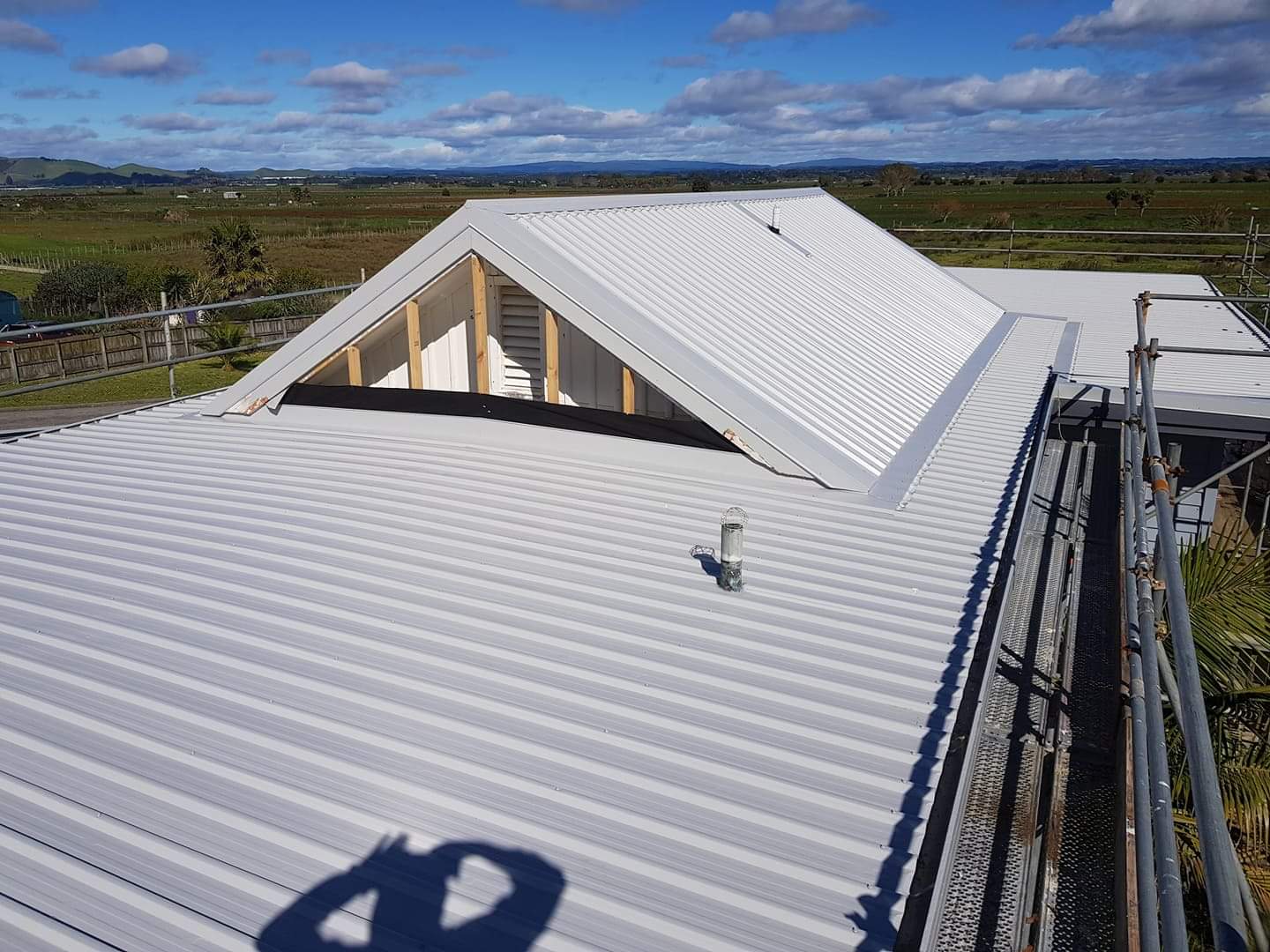 Re-roofing project with metal roofing installed