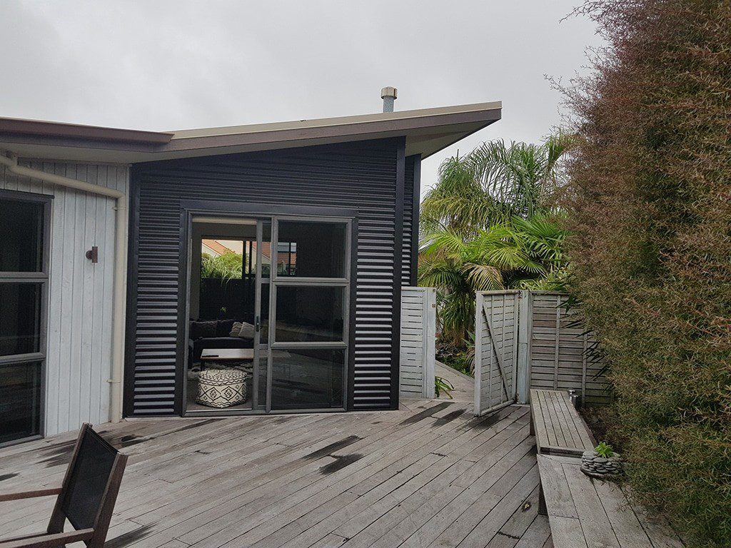 Coloursteel re-cladding on a residential exterior